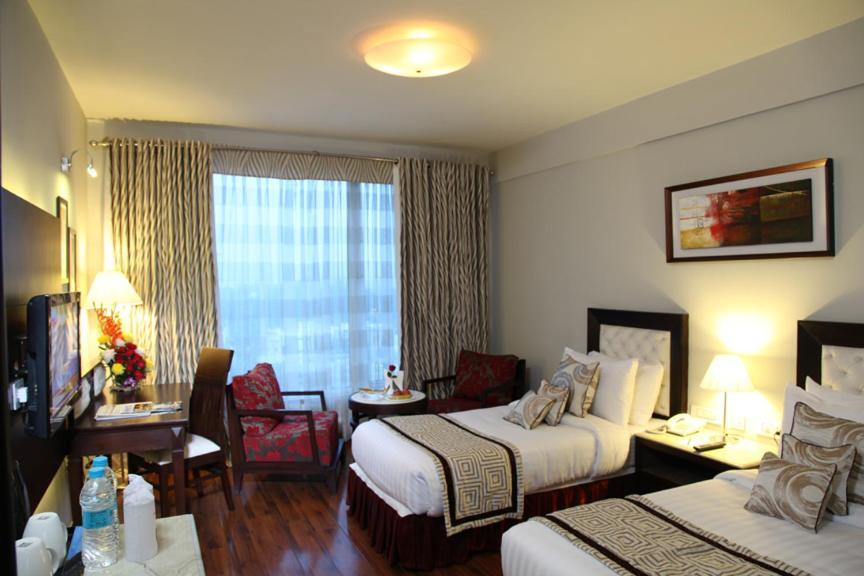 Treehouse Queens Pearl Gurgaon Exterior foto